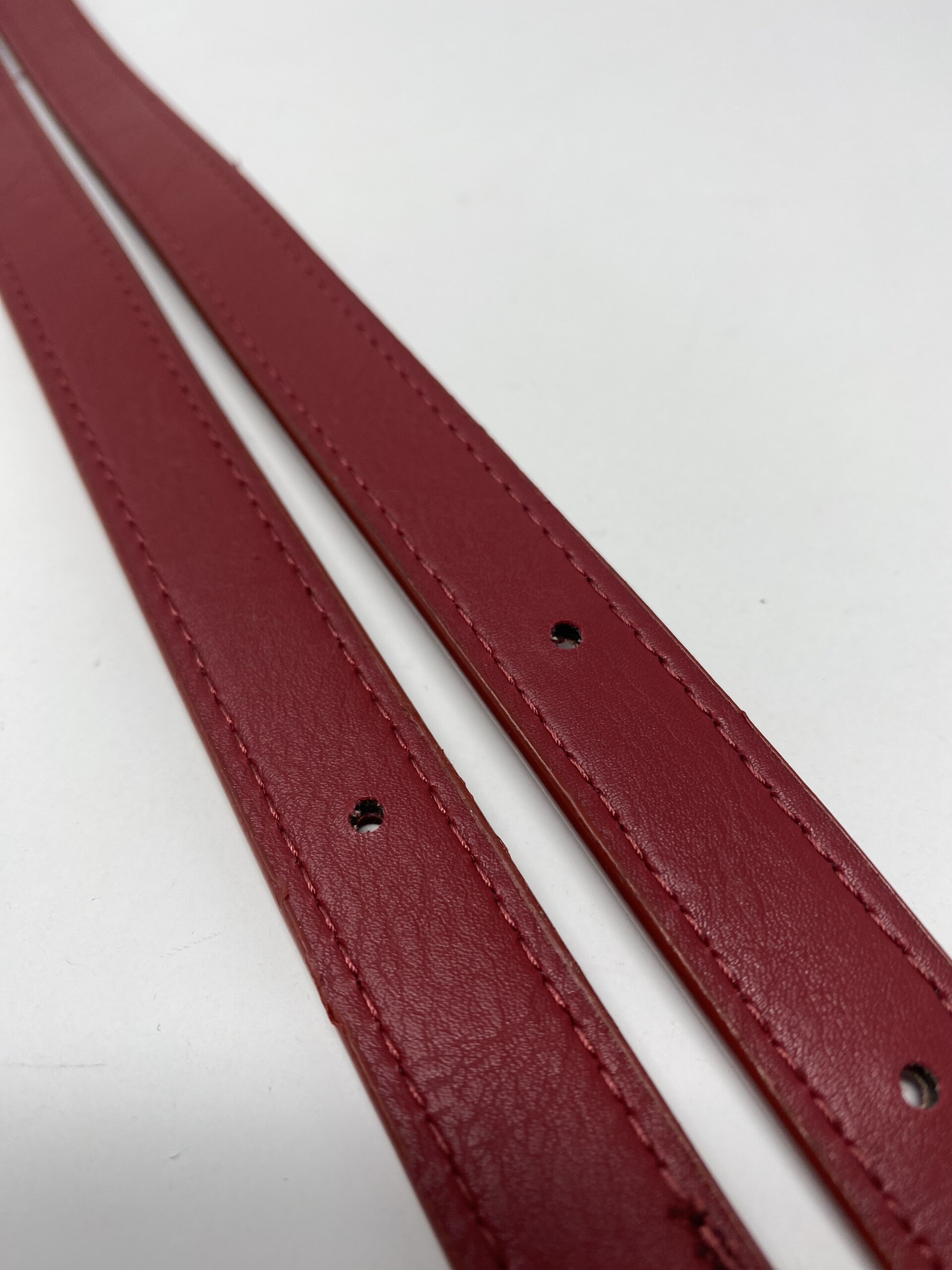 2024-12-13 15.22.04 Rivetable Hole Punched Faux Leather Strap - Red - Image 1